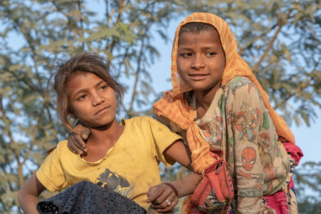 PUSHKAR, INDIA - NOVEMBER 17, 2018: Indian two girl in the desert Thar on time Pushkar Camel Mela...
