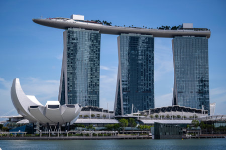 Singapore city, Singapore - february 27, 2020: Marina Bay Sands hotel is an integrated resort fronting Marina Bay on a background of blue sky during the sunny day, Singaporeのeditorial素材