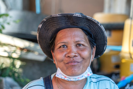 Koh Phangan, Thailand - january 26, 2020: Portrait happy woman on the street market near beach at tropical island Koh Phangan, Thailandのeditorial素材
