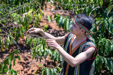 Dalat, Vietnam - march 18, 2020: Young guy in Vietnamese clothes on nature near town in Da Lat, Vietnamのeditorial素材