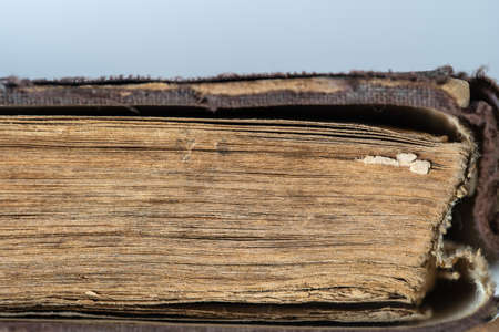 Very old religious book, close up. Old book pages backgroundの写真素材