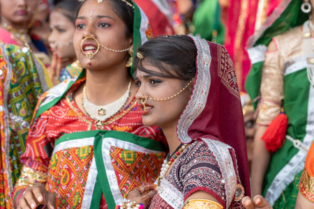 PUSHKAR, INDIA - NOVEMBER 16, 2018: Indian young girl in the desert Thar on time Pushkar Camel Mela near holy city Pushkar, Rajasthan, India, close up portraitのeditorial素材