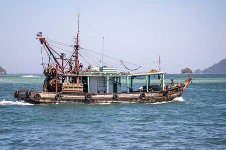 Kota Kinabalu, Malaysia - February 25, 2020: View of fishing boat in South China Sea in the morning of Kota Kinabalu, Malaysiaのeditorial素材