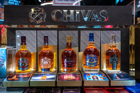 Muscat, Oman - january 19, 2020: Bottles of Chivas Regal scotch whiskey on a shelf in duty free shop airport in Muscat, Omanのeditorial素材