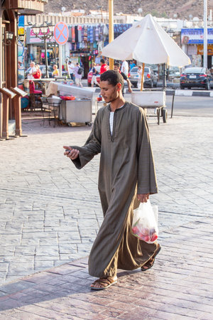 Sharm El Sheikh, Egypt - may 17, 2018: Egyptian man in old city market in Sharm El Sheikh, South Sinai, Egyptのeditorial素材
