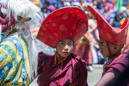 Lamayuru Gompa, Ladakh, India - June 14, 2015: Young buddhist boys during the festival in monastery...