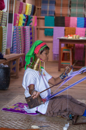 Inle lake, Myanmar, Burma - jan 14, 2016: Padaung Tribal woman poses for a photo in Inle lake, Myanmar, Burma The Padaung-Karen long-necked tribe women are minority of Myanmar.のeditorial素材