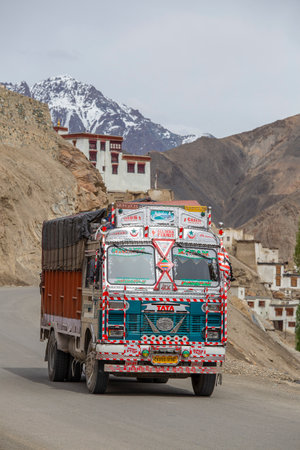Lamayuru Gompa, Ladakh, India - June 15, 2015: Truck on the high altitude Srinagar - Leh road in Lamayuru valley, state of Ladakh, Indian Himalayas, Indiaのeditorial素材