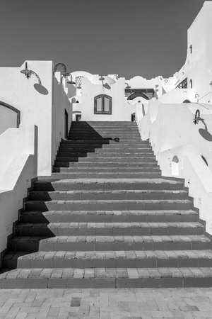 Detail of stairs and white wall of a house on the street of Egypt in Sharm El Sheikh, architecture concept, black and whiteの写真素材