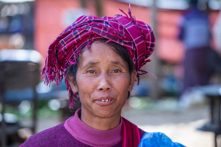 Inle lake, Myanmar, Burma - jan 12, 2016: Old woman on street food market near Inle lake, Myanmar, Burma, close upのeditorial素材