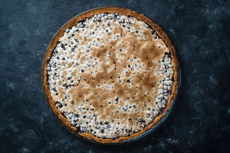 Homemade organic blueberry pie dessert ready to eat, close up. Blueberry meringue pie. Close up, top...