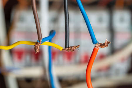 Very dangerous connection of electrical cables at home, close up.の写真素材