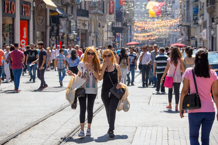Istanbul, Turkey - july 07, 2015 : People walk through one of the busiest shopping streets in Istanbul at istiklal avenue, Turkeyのeditorial素材