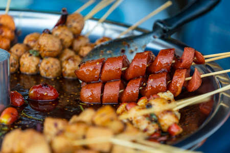 Thai sausage at street food market in Thailand, delicious street food, close upの写真素材