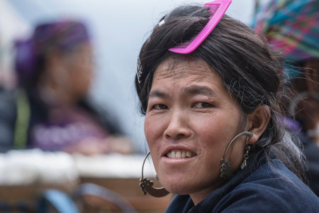 Sapa, Vietnam - march 06, 2020 : Portrait hmong ethnic woman on the street market in mountain...