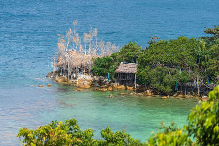 Beautiful tropical beach and blue sea water with green trees in paradise island Koh Phangan, Thailand. travel concept. top viewの写真素材