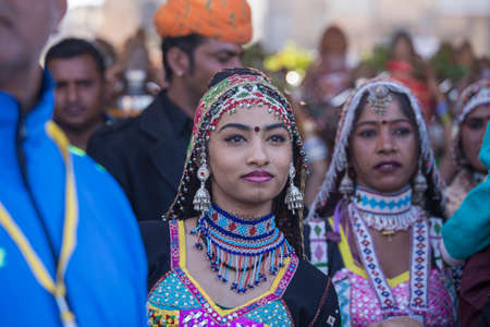 Jaisalmer, India - Feb 08, 2017 : Indian girl wearing traditional Rajasthani dress participate in...
