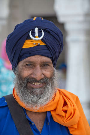 Amritsar, India - Sep 27, 2014 : Sikh man visiting the Golden Temple in Amritsar, Punjab, India. Sikh pilgrims travel from all over India to pray at this holy siteのeditorial素材