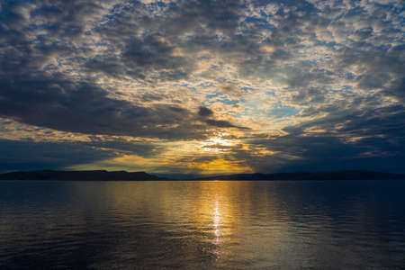 Beautiful view in sunset over Adriatic sea with dramatic sky, Croatia, Central Europe, travel and nature conceptの写真素材