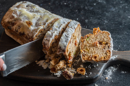 Christmas stollen, traditional German bread for holiday pastry dessert . close up
