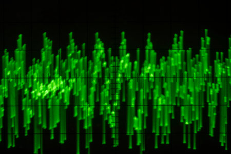 Audio signal on oscilloscope screen. Communication and electronics. Close up, blurred focusの写真素材