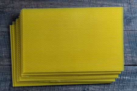Set of honey voshchina of wax honeycomb from a bee hive for filled with honey. Voshchina an artificial basis for the construction of honeycombs, sheet of wax of the cellsの写真素材
