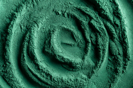 Heap of green spirulina algae powder, close up, top view. Green powder super food, macro. Dietary supplement to improve health. Seaweed superfood concept. Healthy food backgroundの写真素材