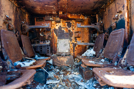 Inside view of burnt-out military infantry fighting vehicle. Burning military vehicles on exhibition...