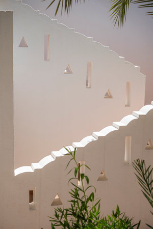 Detail of stairs and white wall of a house on the street of Egypt in Sharm El Sheikh, architecture...