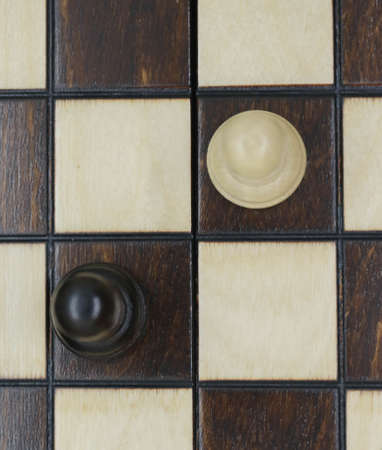 Wooden figures for chess on the board