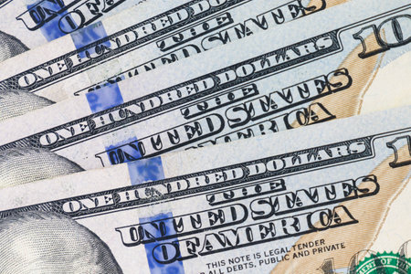 Thundering US dollar bills on a sunny day