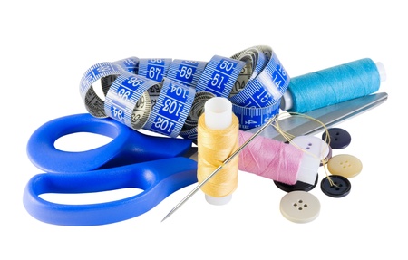 thread and scissors and various items for sewingの写真素材