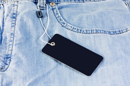 net labels on blue jeans