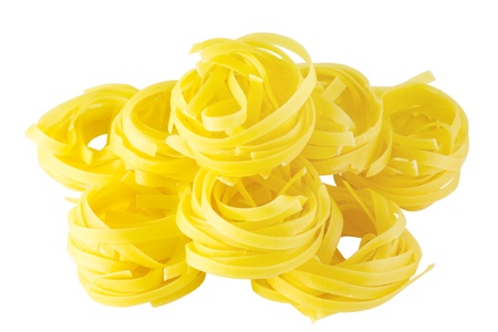 pasta nests isolated on whiteの写真素材
