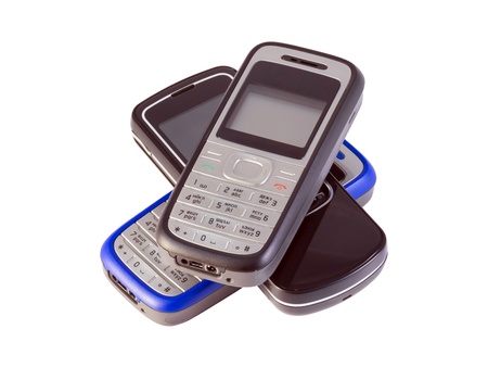 three mobile phone stack isolated on whiteの写真素材