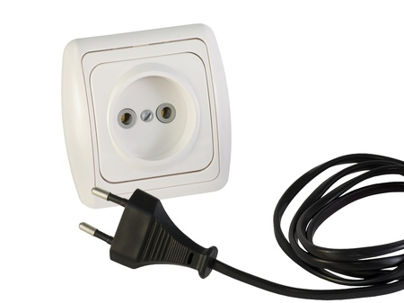white electrical socket and plug with a wire