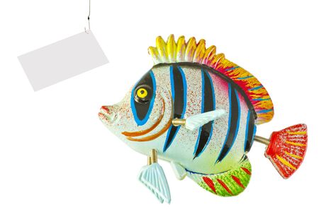 Fish looks at the hook baited with a business cardの写真素材