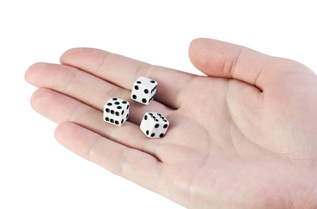 play dice in the palm isolated on whiteの写真素材