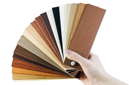 laminate samples in hand isolated on white backgroundの写真素材