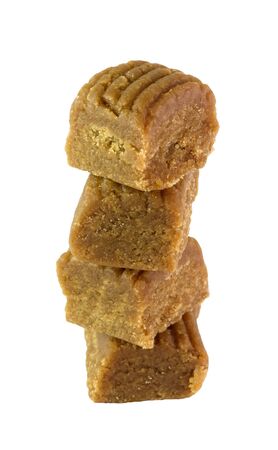 toffee candy pile isolated on whiteの写真素材