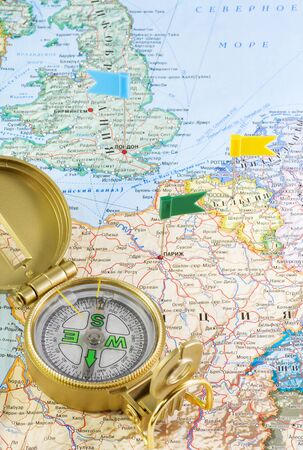 compass and flags on the map of Europeの写真素材