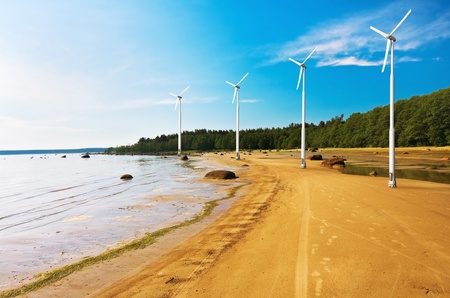 wind power plants on the shore of the seaの写真素材