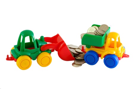 shovel loads a car with a metal moneyの写真素材