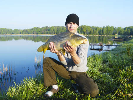 fisherman caught a beautiful big carp at 16 poundsの写真素材