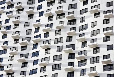 windows and balconies of high-rise residential houseの写真素材