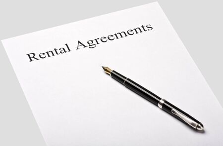 contract rental agreement is isolated on a gray backgroundの写真素材