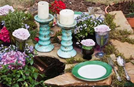 still life with candles, flowers and kitchen utensilsの写真素材