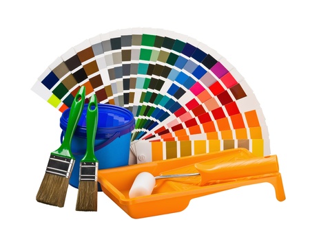 cans of paint, paint brushes, rollers color palette isolated on whiteの写真素材