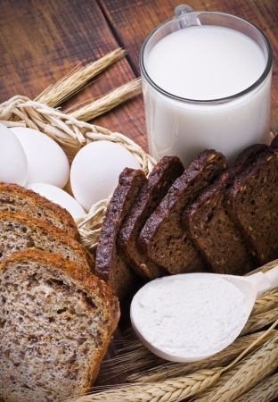 bread, milk, flour and eggs all baking homemade breadの写真素材