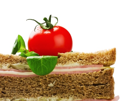 sandwich with ham and chese, tomato isolated on white backgroundの写真素材